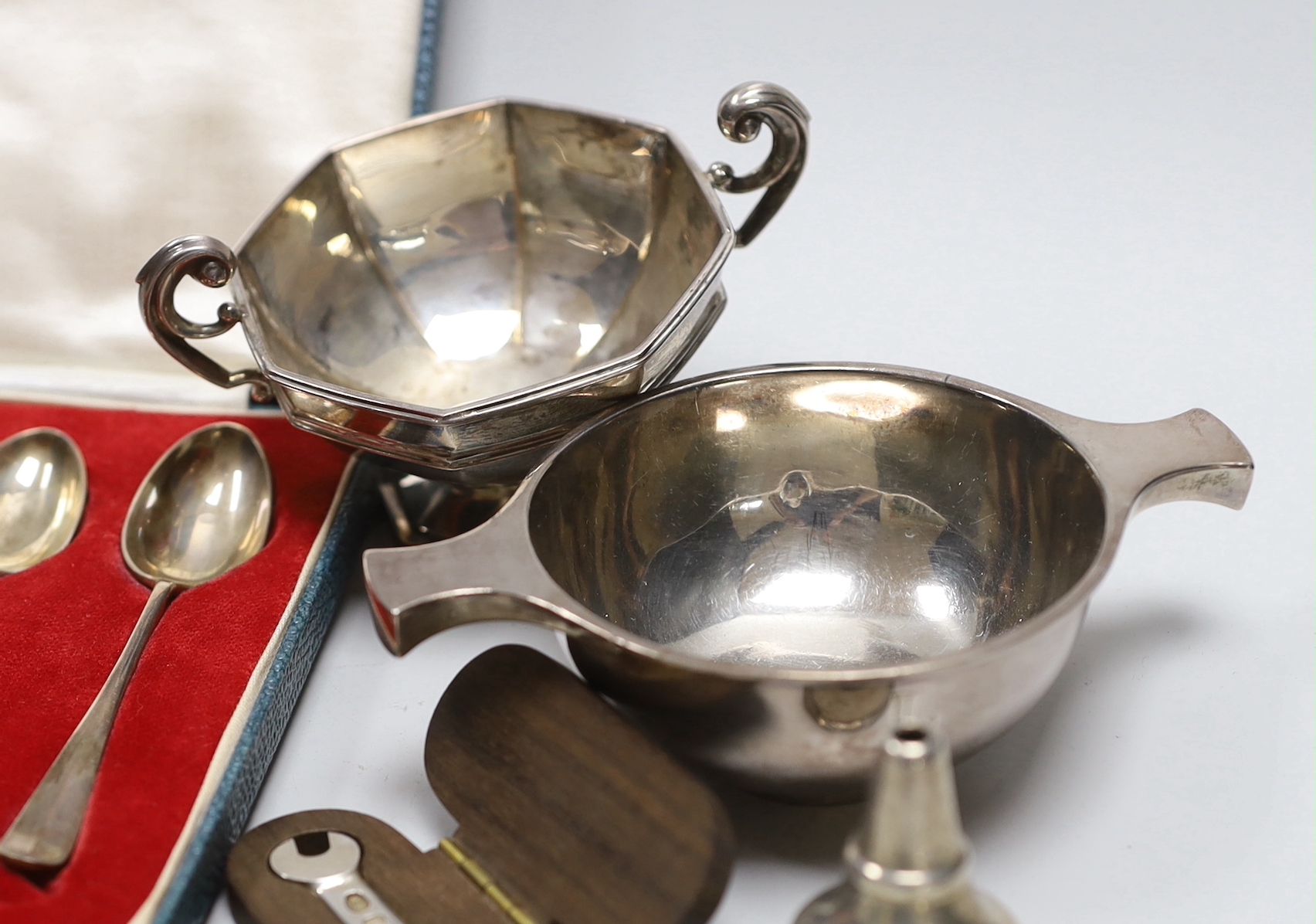 Mixed silver etc. including a George VI silver waiter, silver teaspoons, Scottish silver quaich, a cased silver 25th anniversary spanner etc.